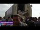 صدى البلد |القوات المسلحة أثناء توزيعها عبوات غذائية بميدان "ليلة القدر" بمدينة 6 اكتوبر