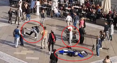 Une racaille en moto renverse une poussette et se fait corriger