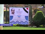 جامعة القاهرة تتزين بلافتات قبل افتتاح قناة السويس الجديدة