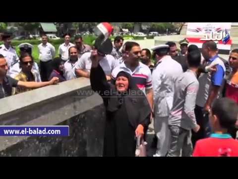 «الداخلية» توزع كروت تهنئة وأعلام احتفالا بقناة السويس الجديدة