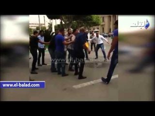 موظف مفصول يحاول اشعال النيران فى نفسه بجامعة القاهرة