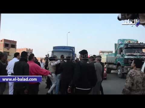 صدى البلد | ملاك عقار مخالف بكرداسة يشتبكون مع قوات الامن لمنع إزالته