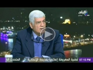 الكاتب الصحفى عبد القادر شهيب واسلام الكتاتنى فى صالة التحرير