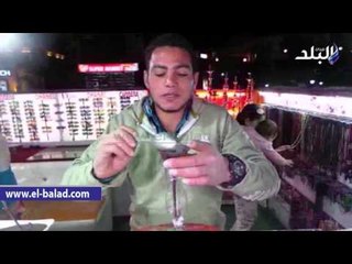 صدى البلد | فنان الرسم بالرمال يرصد احوال السياحة بشرم الشيخ فى زجاجة رمل