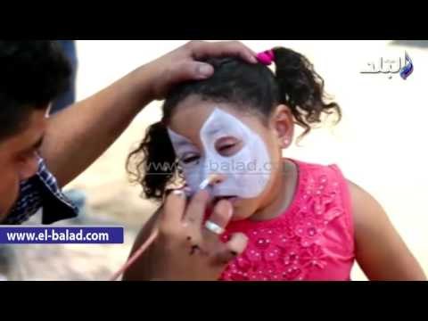 صدى البلد | الأطفال يرسمون وجوههم داخل حديقة الحيوان