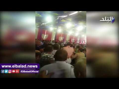 صدى البلد | لحظة اقتحام المواطنين بنك الاسكان والتعمير لحجز شقق ميدينتي