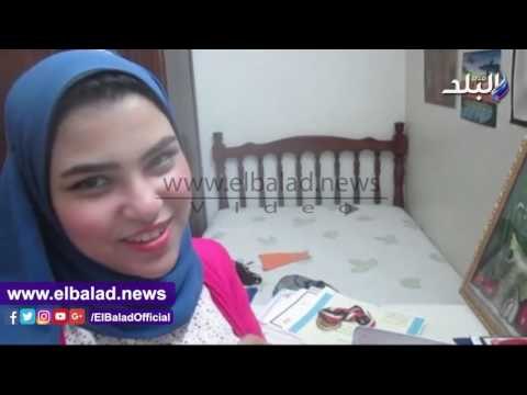 صدى البلد | موهبة بجامعة بالدقهلية ترسم على الارز والسكر والبسكويت