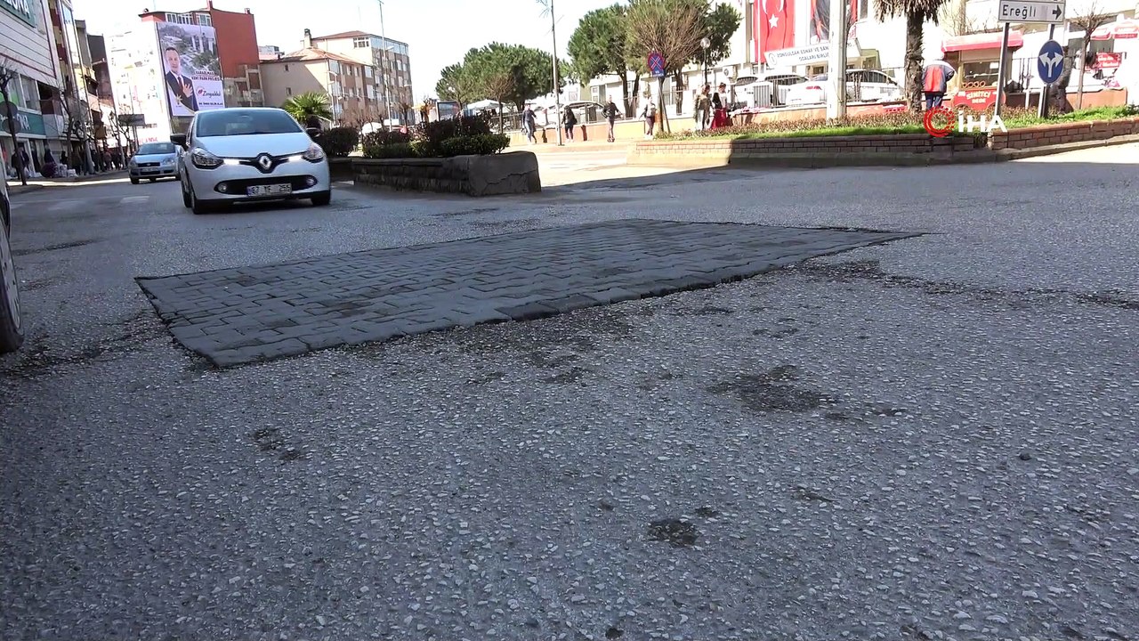 Bir tarafı paket taş, diğer yanı beton