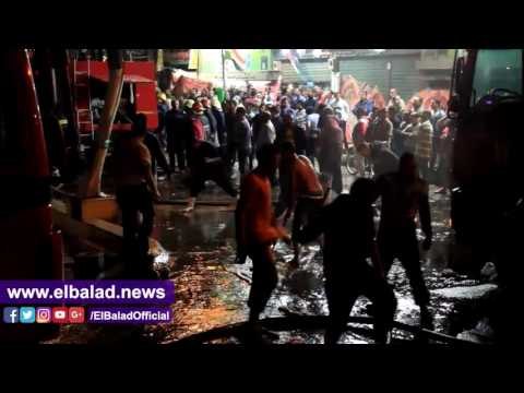 صدى البلد | أهالي الفجالة يرفعون مياه الحريق بـ المساحات