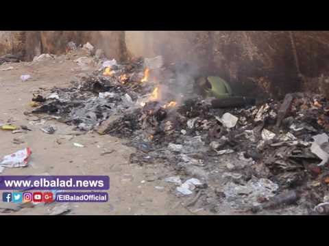 صدى البلد | اشعال النيران فى القمامة أسفل كبرى أكتوبر بالدقى