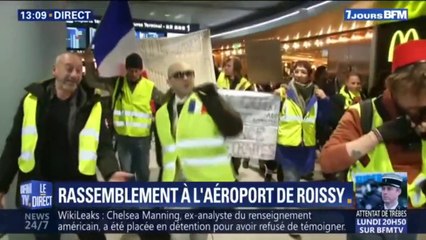 Download Video: Des gilets jaunes manifestent en dansant dans un hall de l'aéroport Paris-Charles-de-Gaulle