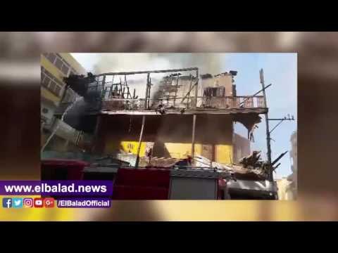 صدى البلد | السيطرة على حريق هائل بعقار خشبي بشارع النهضة ببورسعيد
