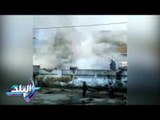 صدى البلد | طائرات من الجيش للسيطرة على حريق سوق ادفو بأسوان