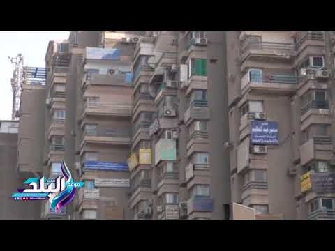 صدى البلد | انتشار اللافتات المخالفة اعلى المبان بشارع فيصل الرئيسي