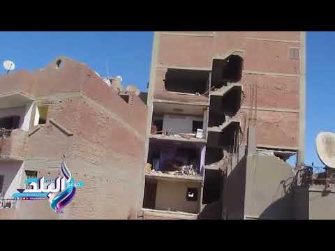 صدى البلد | الحزن يخيم على أصحاب العقارات المجاورة للبرج السكني المنكوب بالفيوم