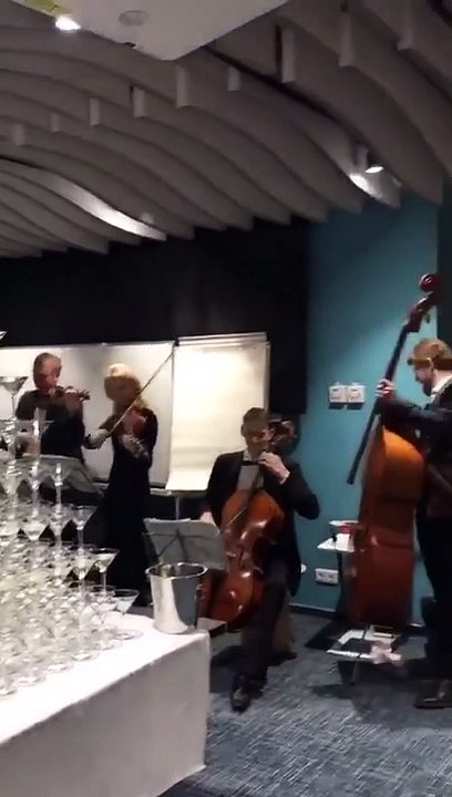 Bartender accidentally knocks down an entire champagne tower