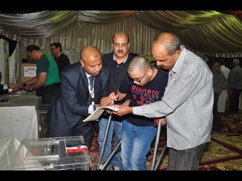 صدى البلد | أبطال في الغربة تحدوا إعاقتهم للوصول إلى لجان انتخابات المصريين بالخارج