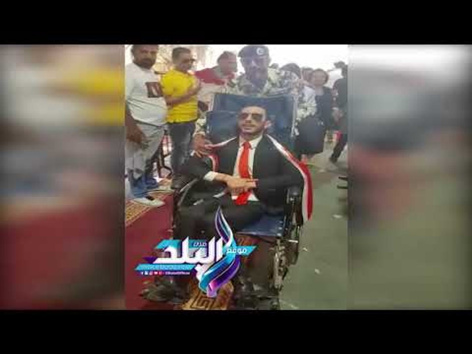 صدى البلد | لفتة إنسانية من شرطي كويتي لشاب مصري "من ذوي الإحتياجات " في الإنتخابات الرئاسية