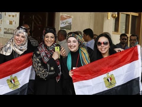 صدى البلد | الناخبون يحتفلون بالانتخابات الرئاسية على أنغام «تسلم الأيادي» بـ«مدينتي»