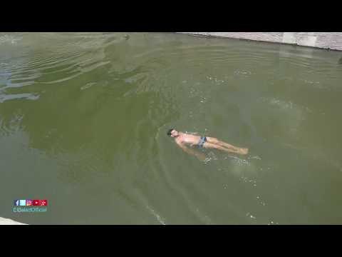 صدى البلد | مصيف الغلابة : شباب يقفزون في النيل هربا من ارتفاع درجة الحرارة