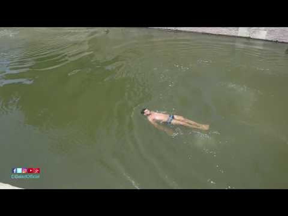 صدى البلد | مصيف الغلابة : شباب يقفزون في النيل هربا من ارتفاع درجة الحرارة