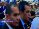 صدى البلد |الرئيس السيسى يحتضن أحد أبناء الشهداء عقب صلاة عيد الفطر