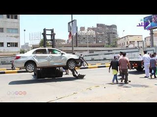 صدى البلد | رفع حطام حريق سيارتي الدقي