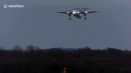 Roller coaster ride! Tiny turboprop plane buffeted by high winds in aborted Dusseldorf landing