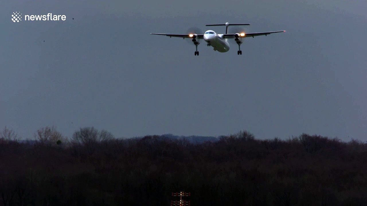 Roller coaster ride! Tiny turboprop plane buffeted by high winds in aborted Dusseldorf landing