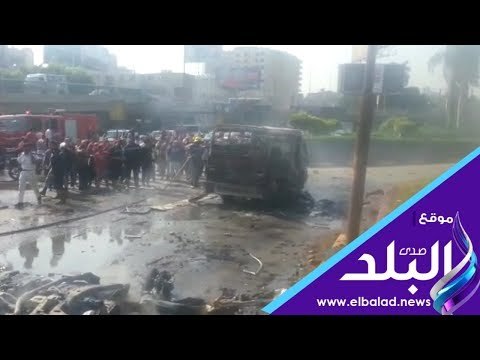 صدى البلد | فرض كردون امني بمحيط حريق سيارتين اسفل كوبري اكتوبر