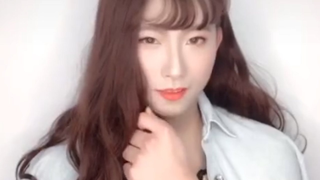 Video of police officer dressing up as woman to warn about dating scams becomes online sensation