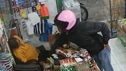 Shopkeeper snoozes through robbery in Indonesia