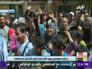شاهد احتفالات المصريين بالمنيب امام اللجان الانتخابية