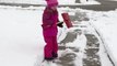 Toddler Hilariously Tries to Shovel Snow From Driveway