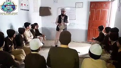 Mr. Atta Ullah during Maths class