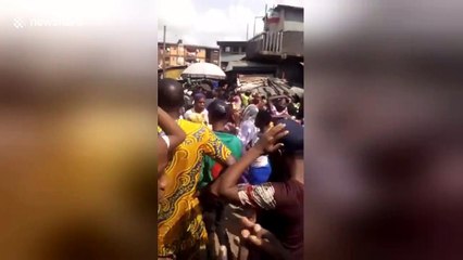 School children rushed to hospital after being pulled from collapsed building in Lagos