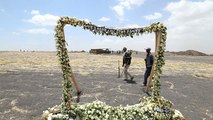 Relatives mourn their loved ones at Ethiopian Airlines crash site