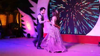 Couple dance in their reception