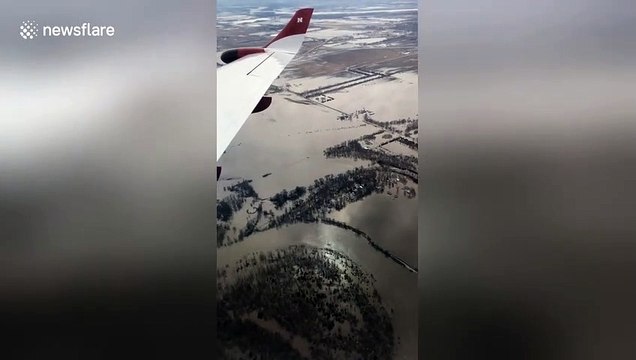 No way out of US city as flooding devastates roads and farmlands