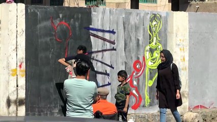 رسوم جدارية في صنعاء تعكس الخوف والأمل