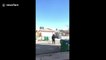 Man makes awesome deflection ball shot through basketball hoop