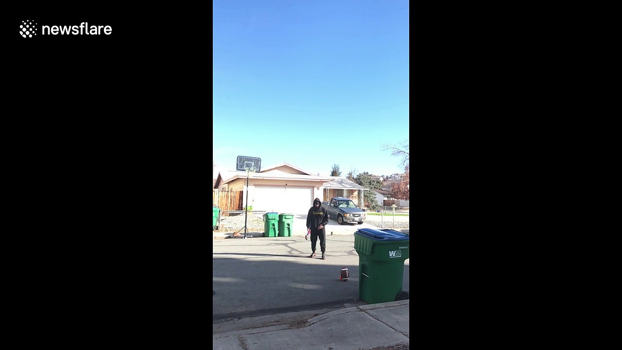 Man makes awesome deflection ball shot through basketball hoop