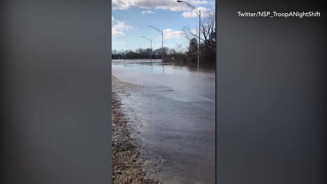 Road turns into river in midst of flash flooding