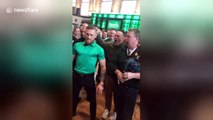 Conor McGregor shows off some moves when he hears bagpipes in Chicago