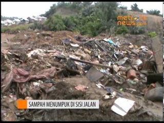 Sampah Menumpuk di Sisi Jalan Ringroad Manado