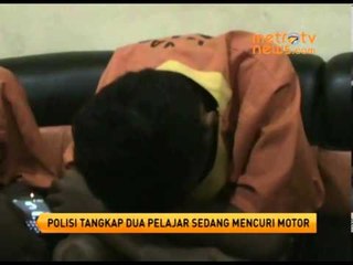 polisi tangkap dua pelajar sedang mencuri motor