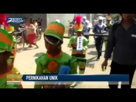 Sepasang Pengantin Diarak dengan Delman Keliling Kampung
