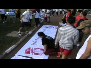 Dukung Jokowi Presiden, Warga Medan Bubuhkan Tandan Tangan