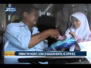 Imbau tak Ngebut, Siswa SD Bagikan Bantal ke Sopir Bus
