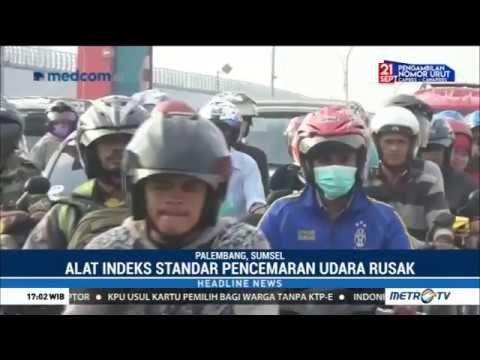 Palembang Diselimuti Asap, Warga Kenakan Masker Cegah ISPA